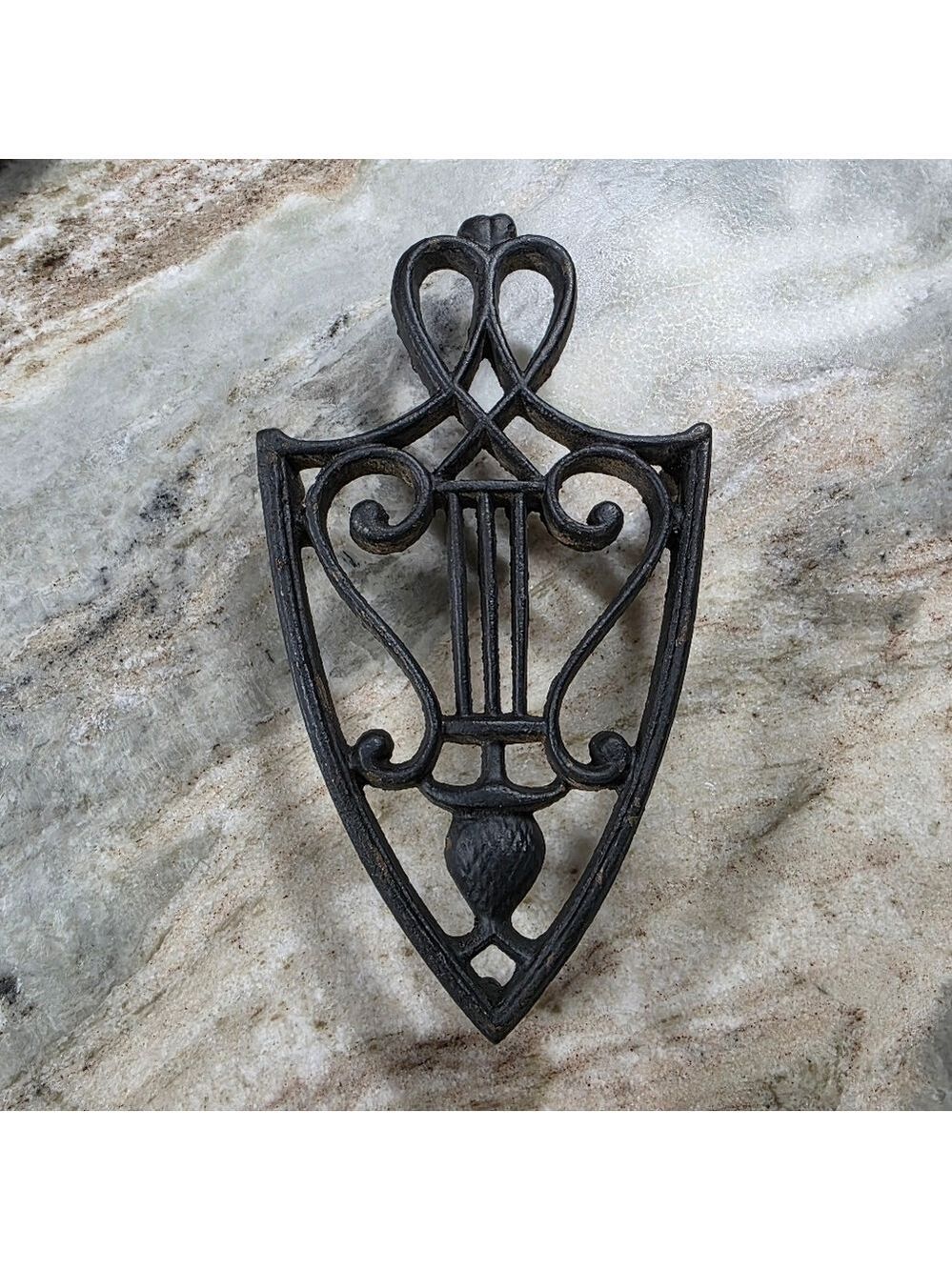 ​Vintage Cast Iron Lyre and Pineapple Trivet - 3 Legged Sad Iron Stand